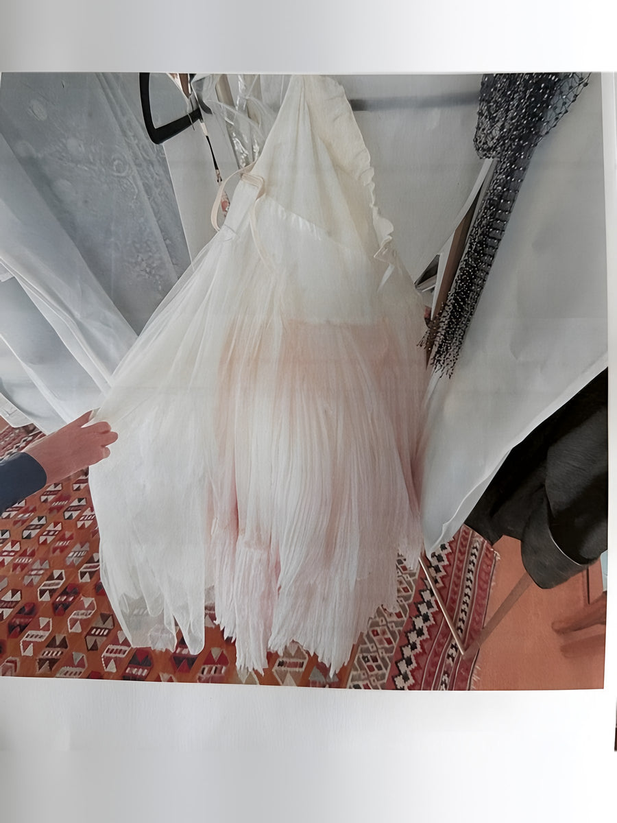 Passage 25 – Robe plissée beige